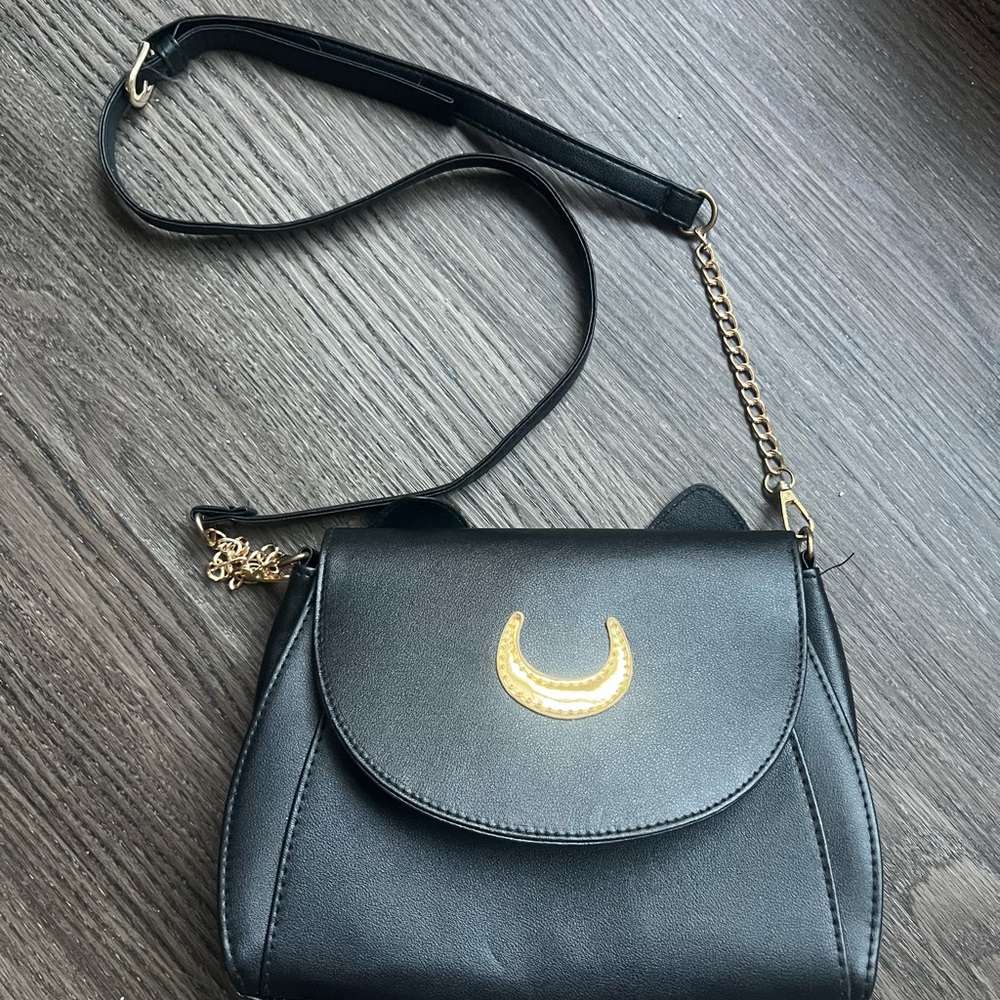 Elegant Black and Gold Women's Bag